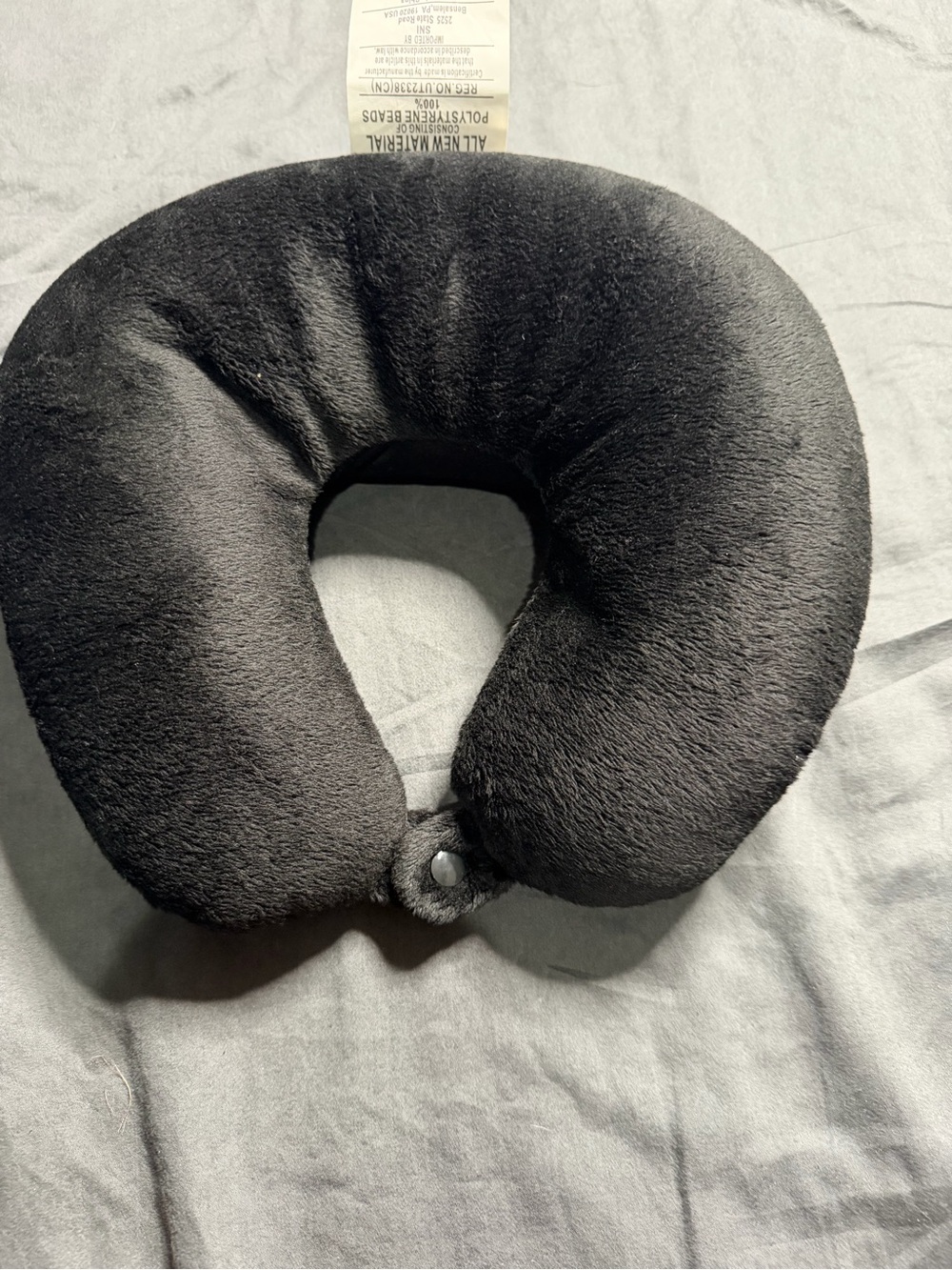 Plush Black Memory Foam Travel Neck Pillow with Snap Closure